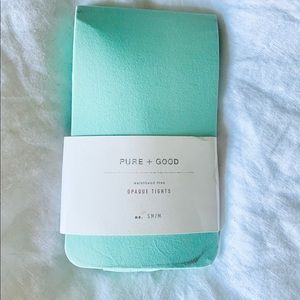 Mint green tights by Anthropologie